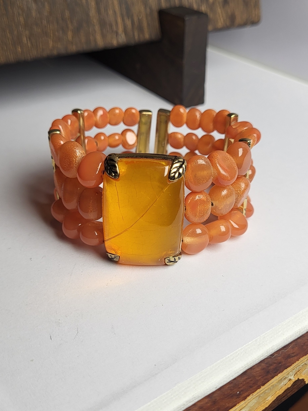 Triple-Row Orange Beaded Bracelet with Amber Center